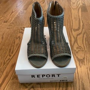 Grey open toe high heel shoes